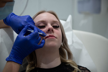 Facial Dermal Fillers Treatment In Progress 